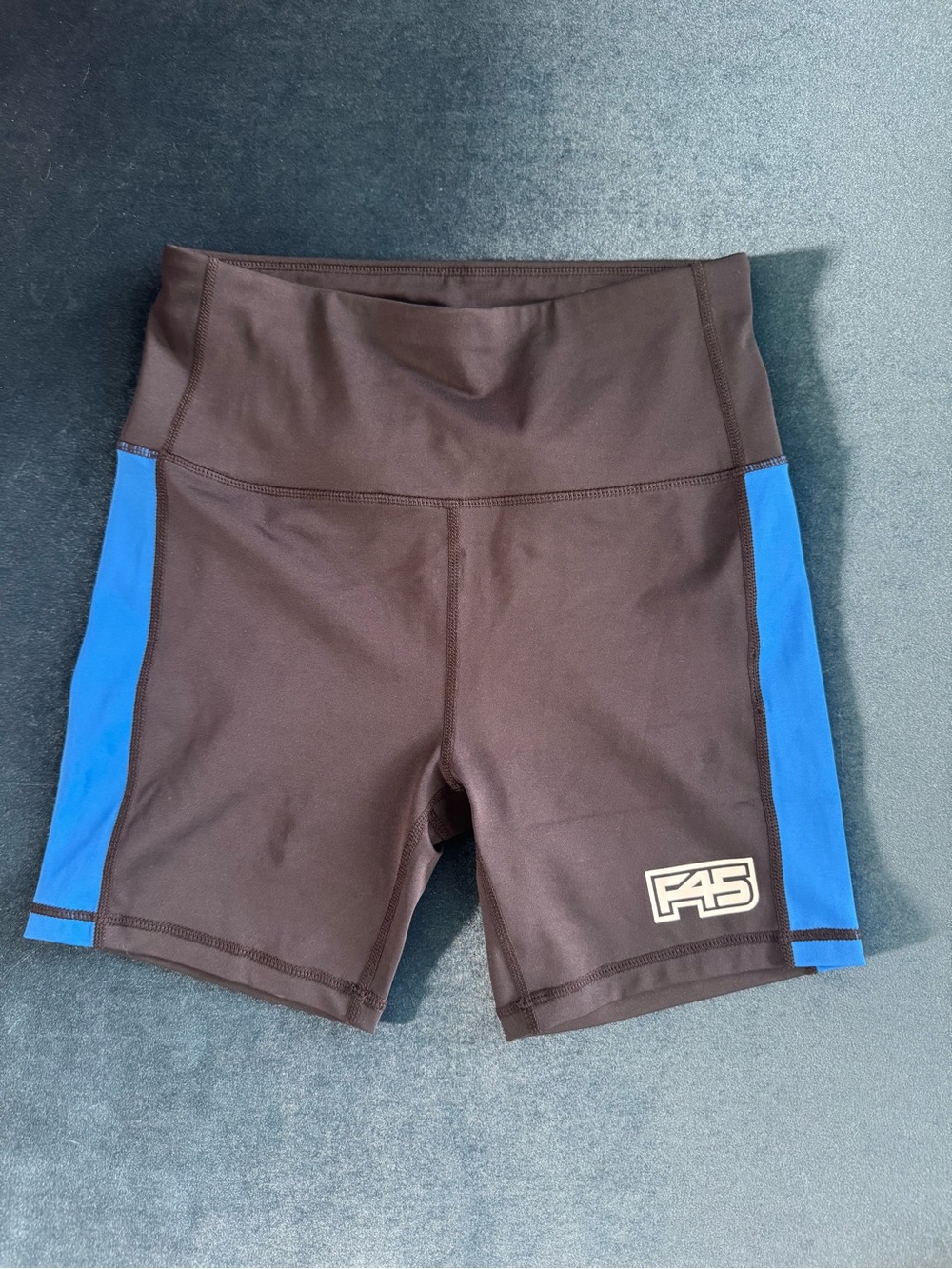 F45 COACH Biker Performance Shorts in Black with Blue Panels